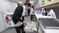 Staff preparing prescriptions at a pharmacy