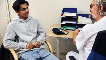 Young person in medical consultation
