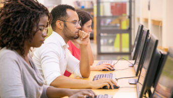 People undertaking assessment on computers