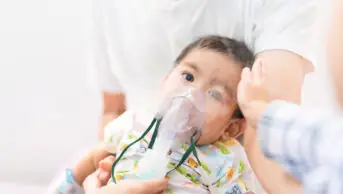 Young boy with nebuliser