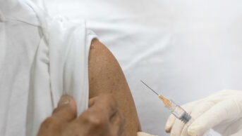 Older person having vaccination