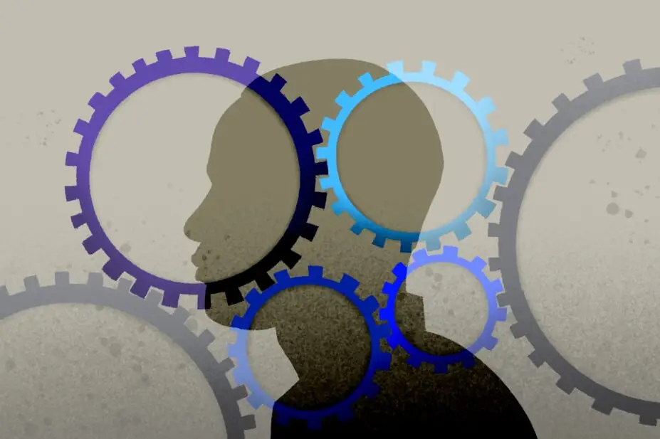 Illustration of a silhouetted head, with four coloured cogs turning in the background