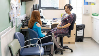 Photo of face-to-face GP consultation taking place