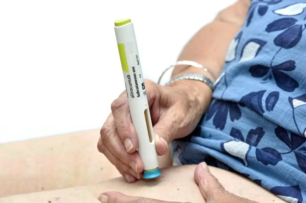 Alirocumab (tradename Praluent) pen in use to administer subcutaneous injection