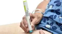 Alirocumab (tradename Praluent) pen in use to administer subcutaneous injection