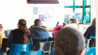 Photo of a very busy medical waiting room