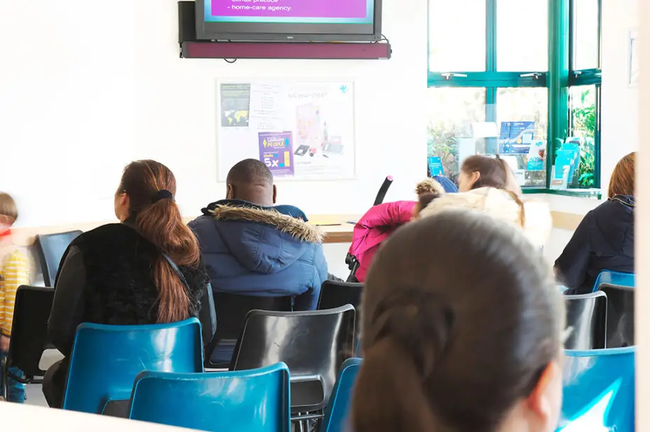 Photo of a very busy medical waiting room