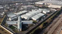 An aerial view of HMP YOI Peterborough which is a Category B prison for men and women in Cambridgeshire, UK