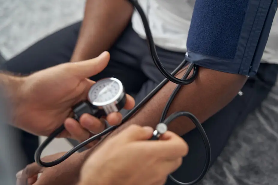 Patient gets blood pressure taken.