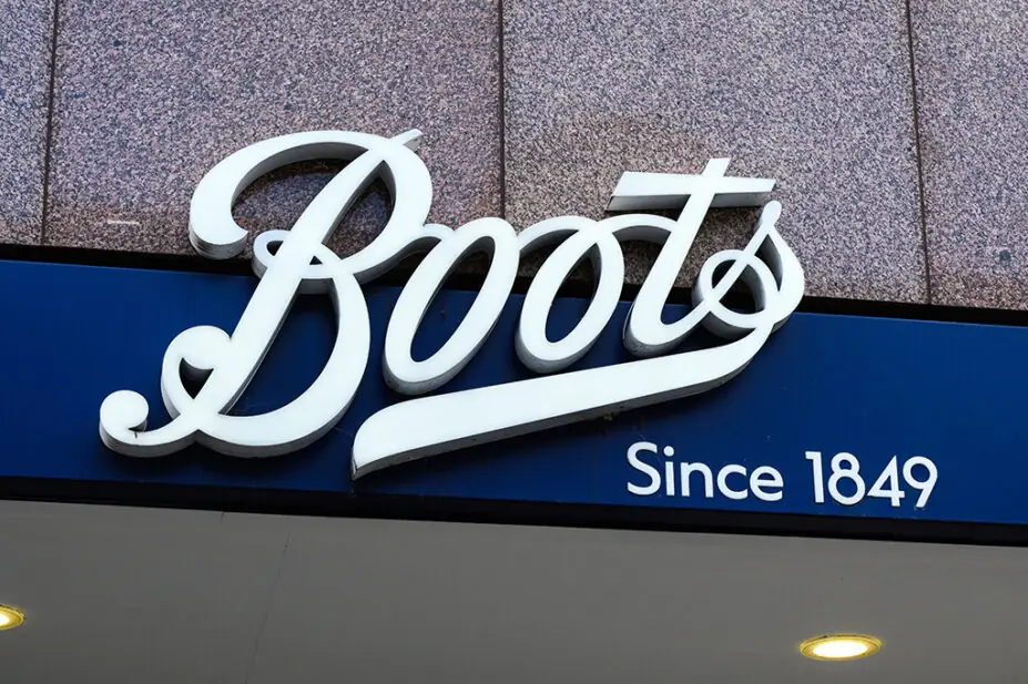 Boots signage above shop door