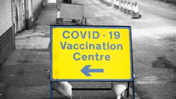 Vaccination centre for COVID-19 road sign