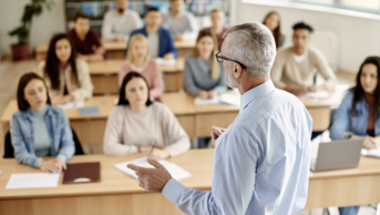 Professor conducts a lecture to university students