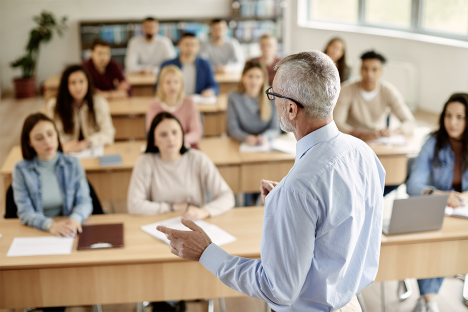 Professor conducts a lecture to university students