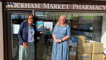 Sarah Cavanagh, regional public health pharmacist, NHS England — East of England, with pharmacist Sarah Barrowclough, outside Wickham Market Pharmacy in Suffolk