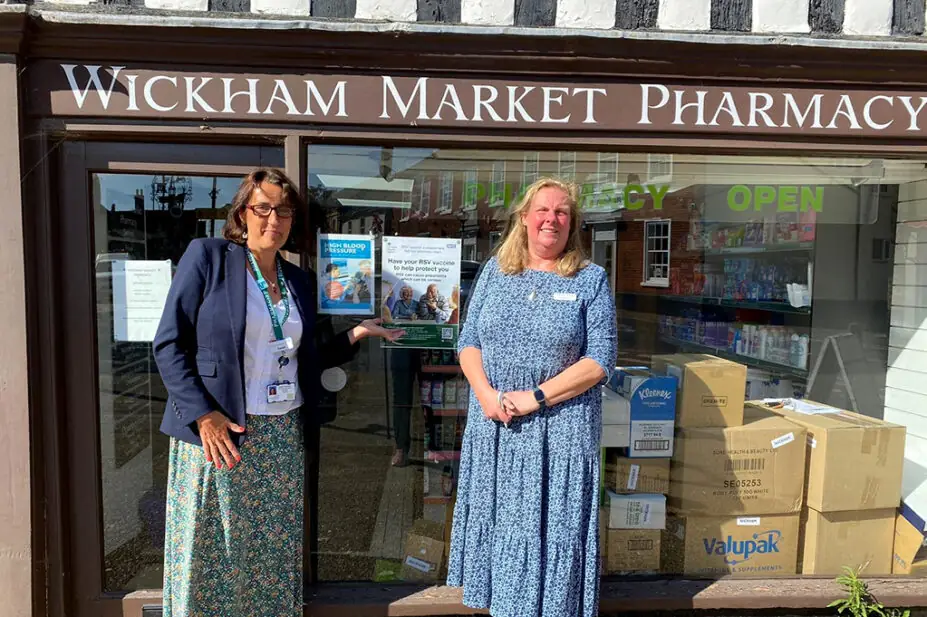 Sarah Cavanagh, regional public health pharmacist, NHS England — East of England, with pharmacist Sarah Barrowclough, outside Wickham Market Pharmacy in Suffolk