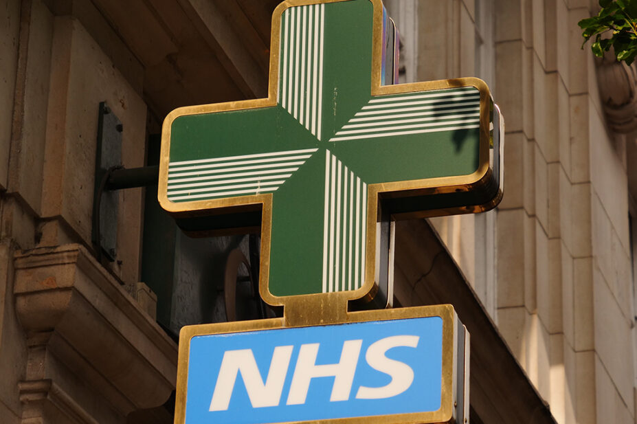 NHS pharmacy sign in street, London