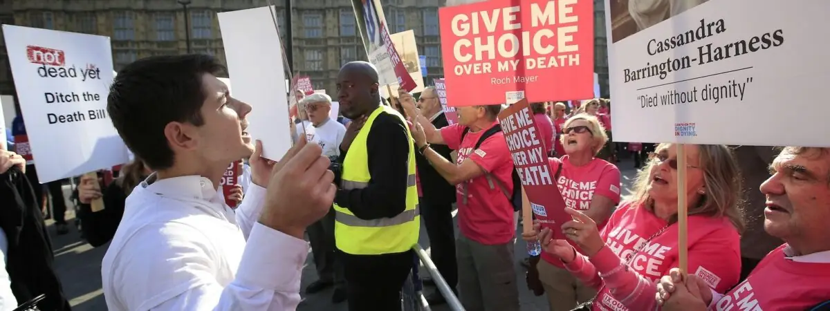 Protesters outside the Houses of Parliament in London as MPs debate and vote on the Assisted Dying Bill.