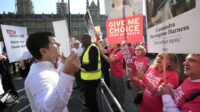 Protesters outside the Houses of Parliament in London as MPs debate and vote on the Assisted Dying Bill.