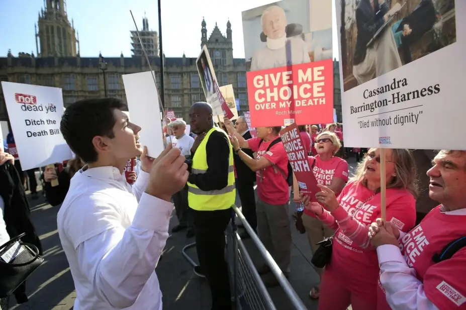 Protesters outside the Houses of Parliament in London as MPs debate and vote on the Assisted Dying Bill.