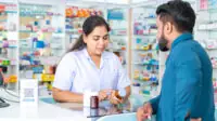 Pharmacist consults with patient