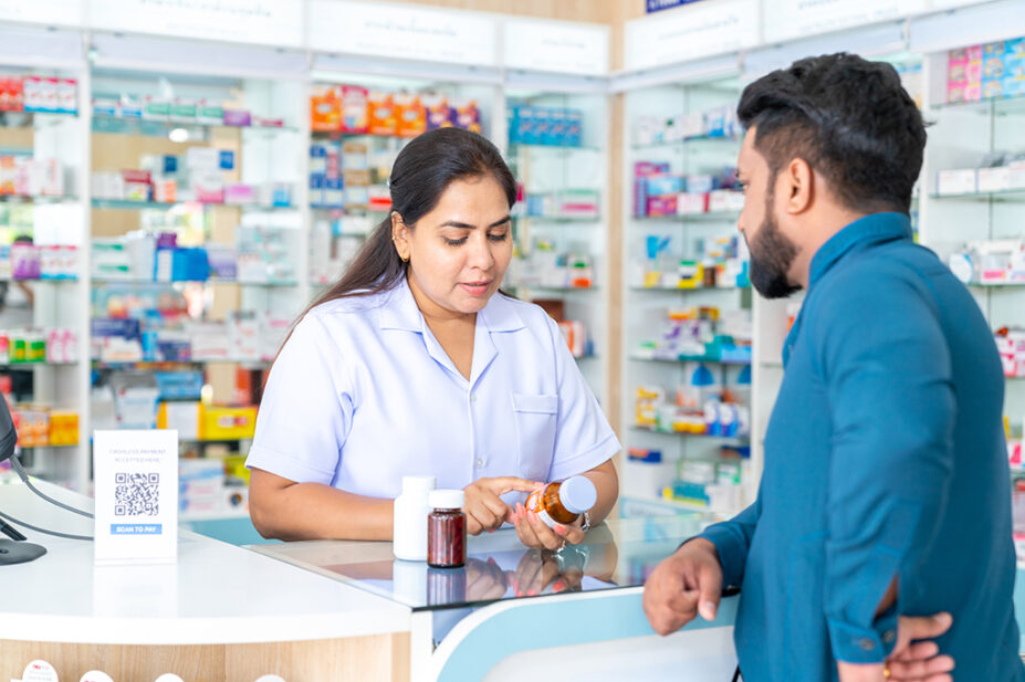 Pharmacist consults with patient