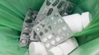 Rubbish bin full of medicines