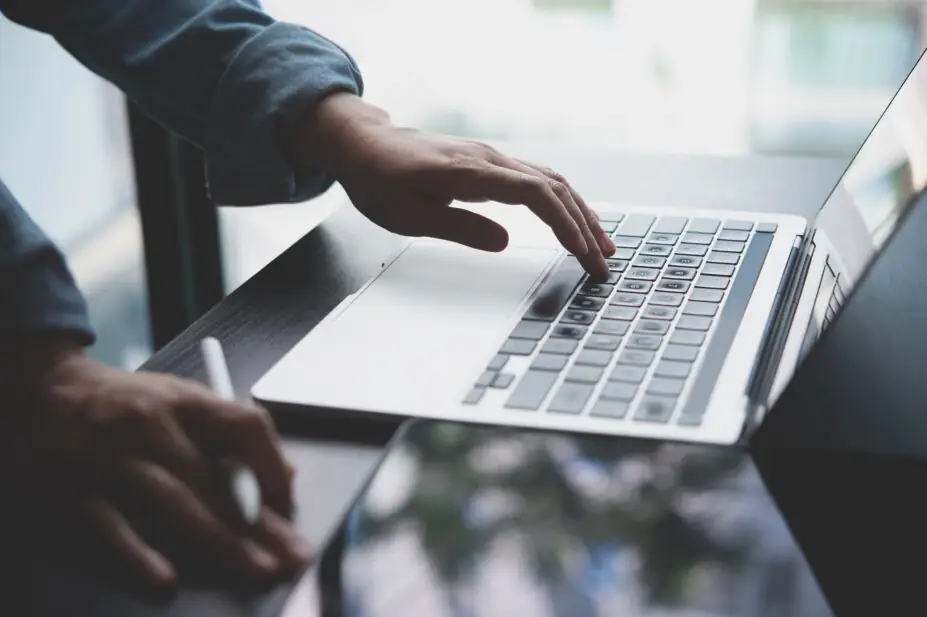 A person using a laptop computer