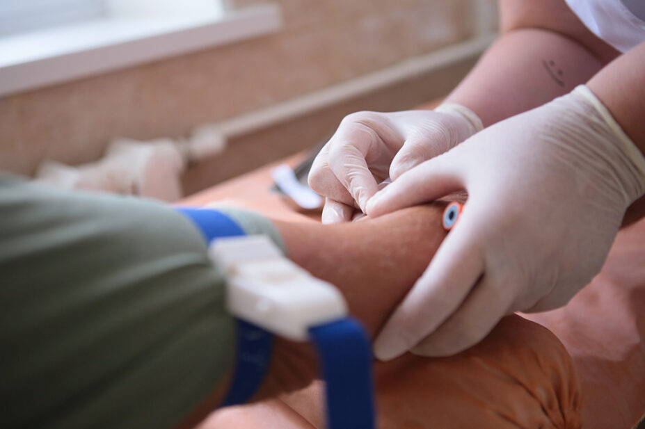 Woman undertaking a blood test