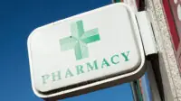 UK pharmacy sign outside a building