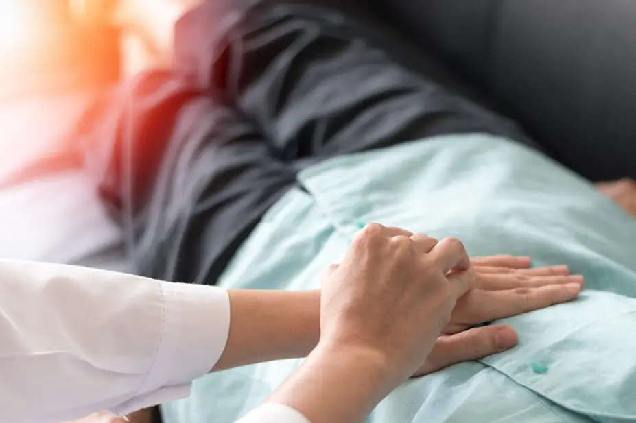 Someone's abdomen being examined by physician