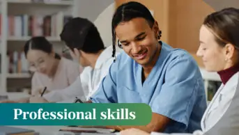 Diverse group of young medical professionals being taught at table during meeting