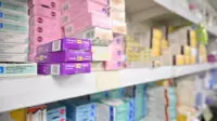 Pharmacy shelves in a UK pharmacy