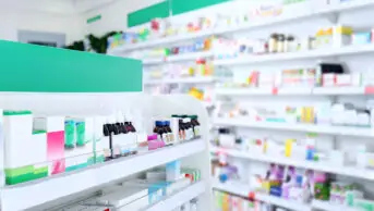 The stocked shelves inside a pharmacy