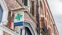 Burslem, Stoke on Trent, England, pharmacy signage on Edwardian building