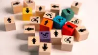 Wooden cubes that represent concept of inclusion and equity