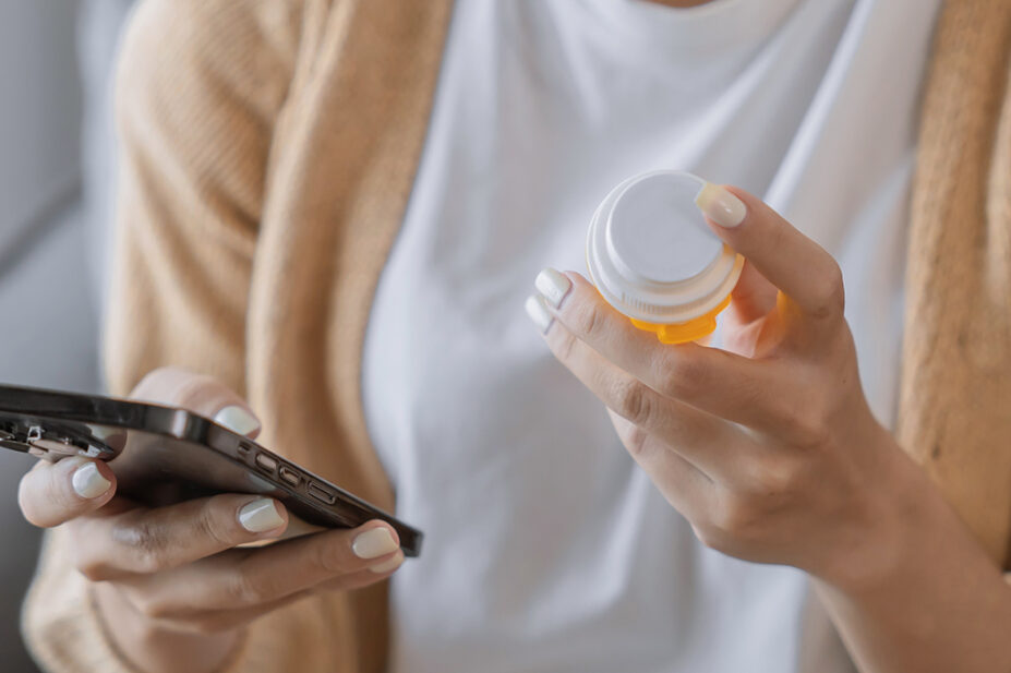 A woman orders medications via an online pharmacy