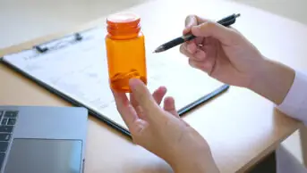 A healthcare professional conducts a structured medication review