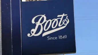 The boots sign outside of a community pharmacy