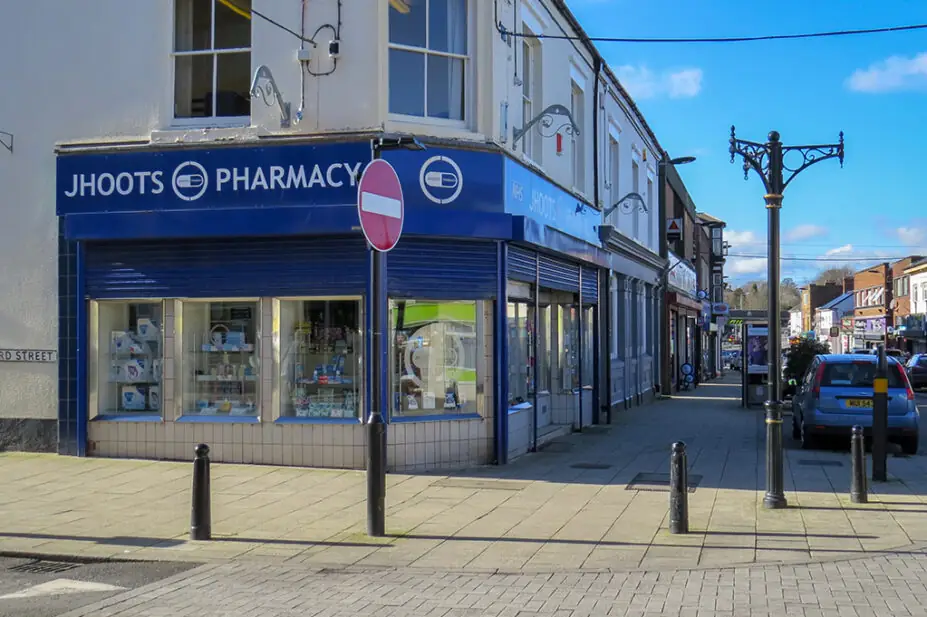 The outside of a Jhoots pharmacy on a high street