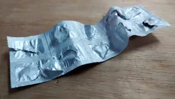 An empty packet of tablets
