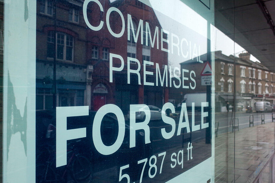 For sale sign in commercial premises window