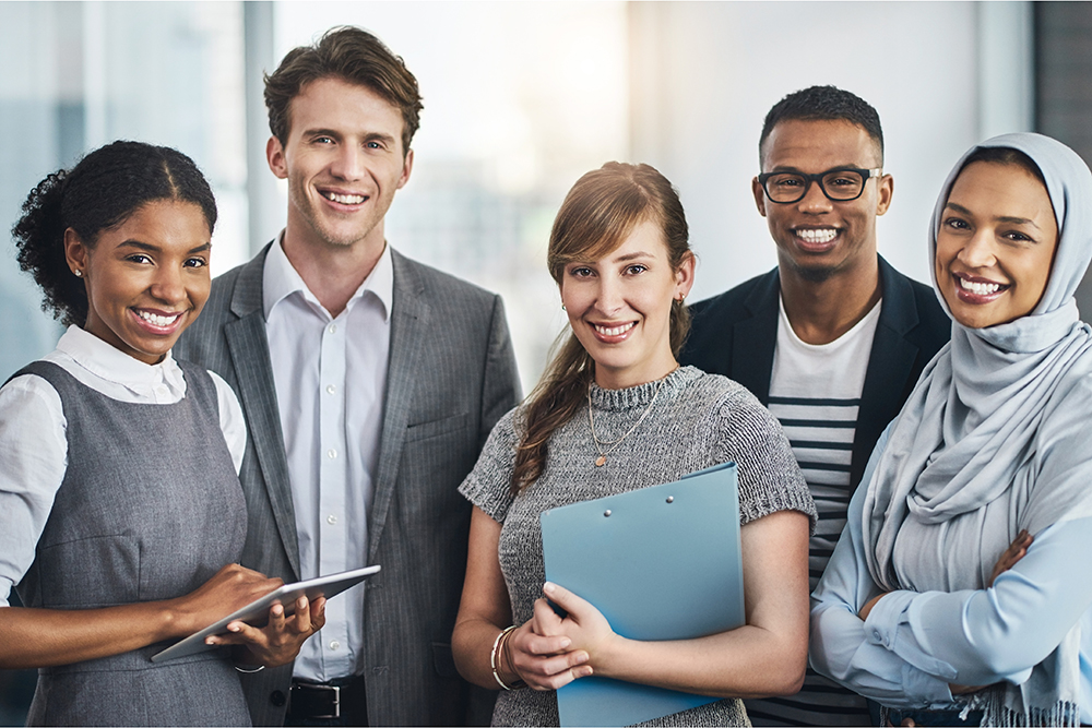 Photo of a team with diverse background, in circular focus on the different team members, with the words "Professional Skills" overlayed