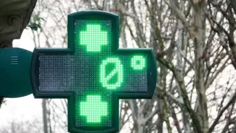 Pharmacy cross sign showing 0 degrees celsius
