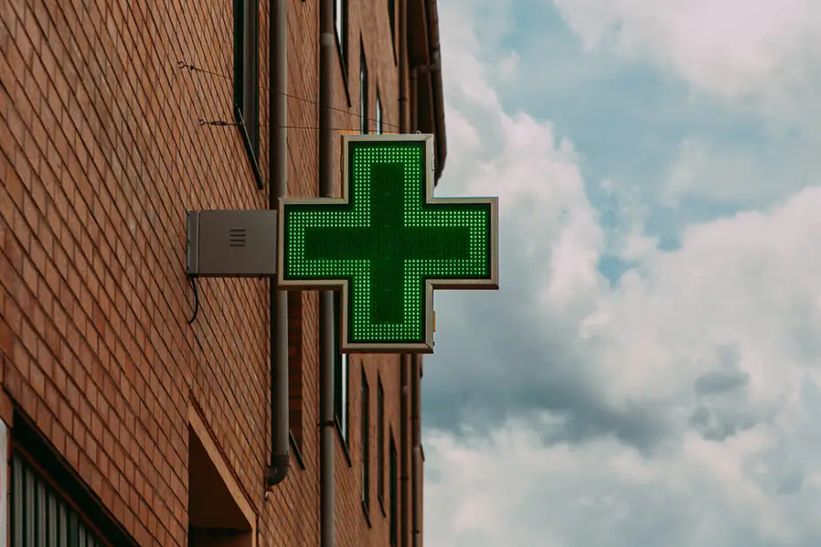 The sign outside of a community pharmacy