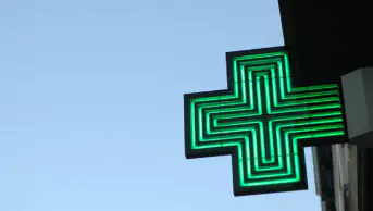 The sign outside of a community pharmacy