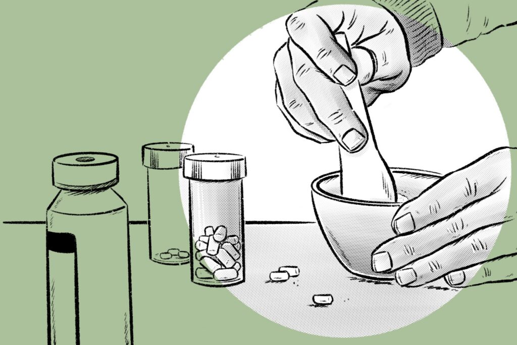 Tablets being crushed in a pestle and mortar