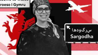 Rafia Jamil stands in front of a red and black backdrop, she wears glasses, headscarf and black top. She smiles. In the background is a sign for Wales, a Welsh dragon in red, a street sign for Sargodha and a silhouette of a plane