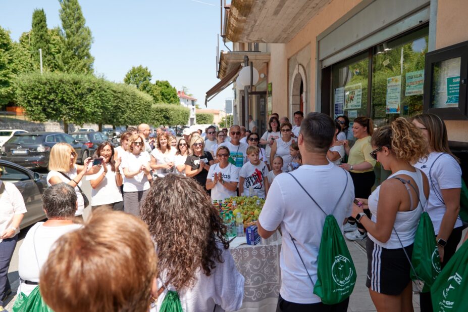 Walkers gathered outside pharmacy getting ready to start