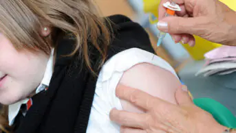 A girl receives a human papillomavirus vaccination