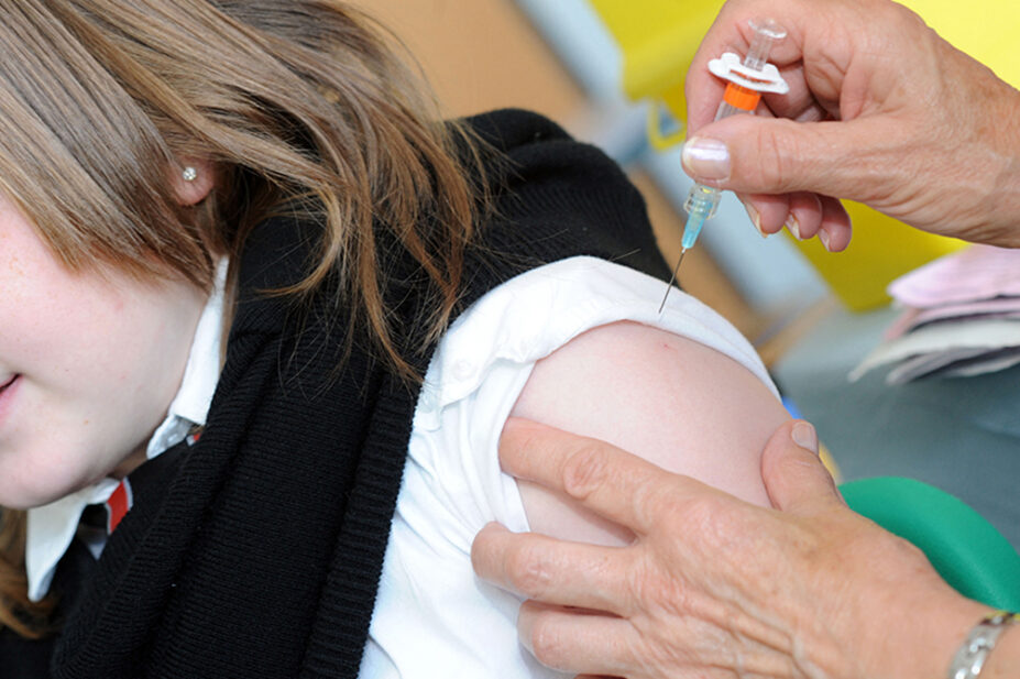A girl receives a human papillomavirus vaccination